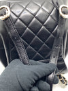 CHANEL Black lambskin Mini Duma Drawstring Backpack / Gold Hardware