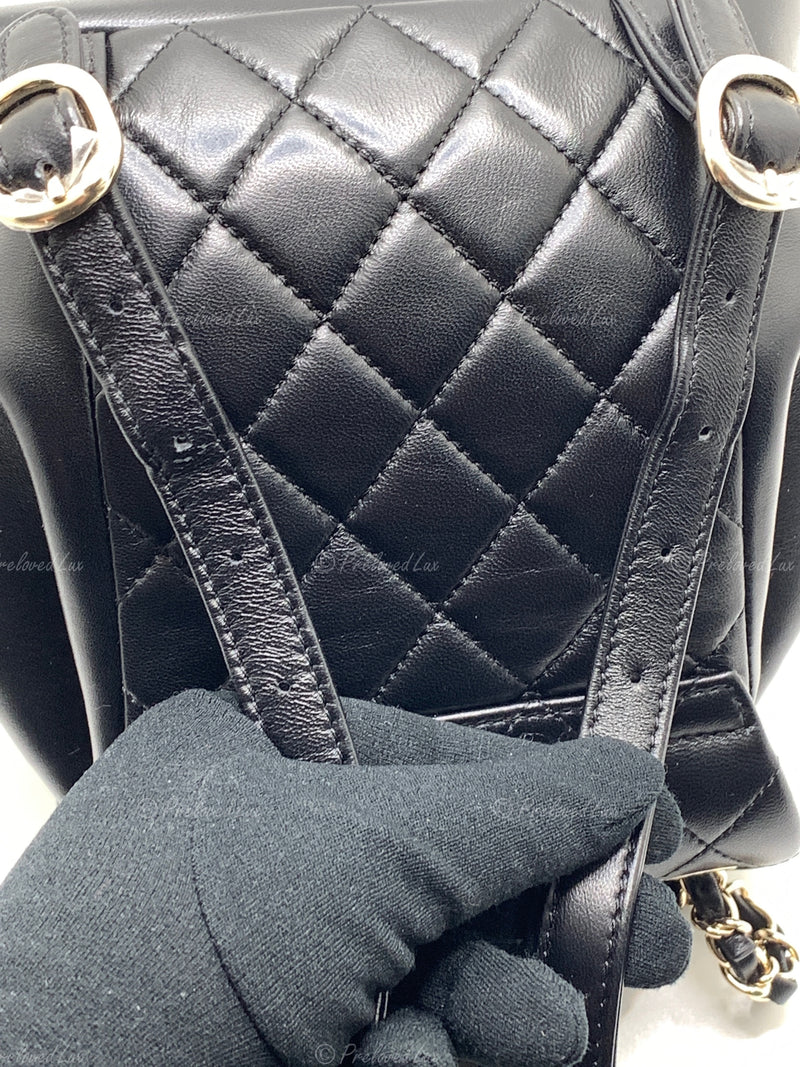 CHANEL Black lambskin Mini Duma Drawstring Backpack / Gold