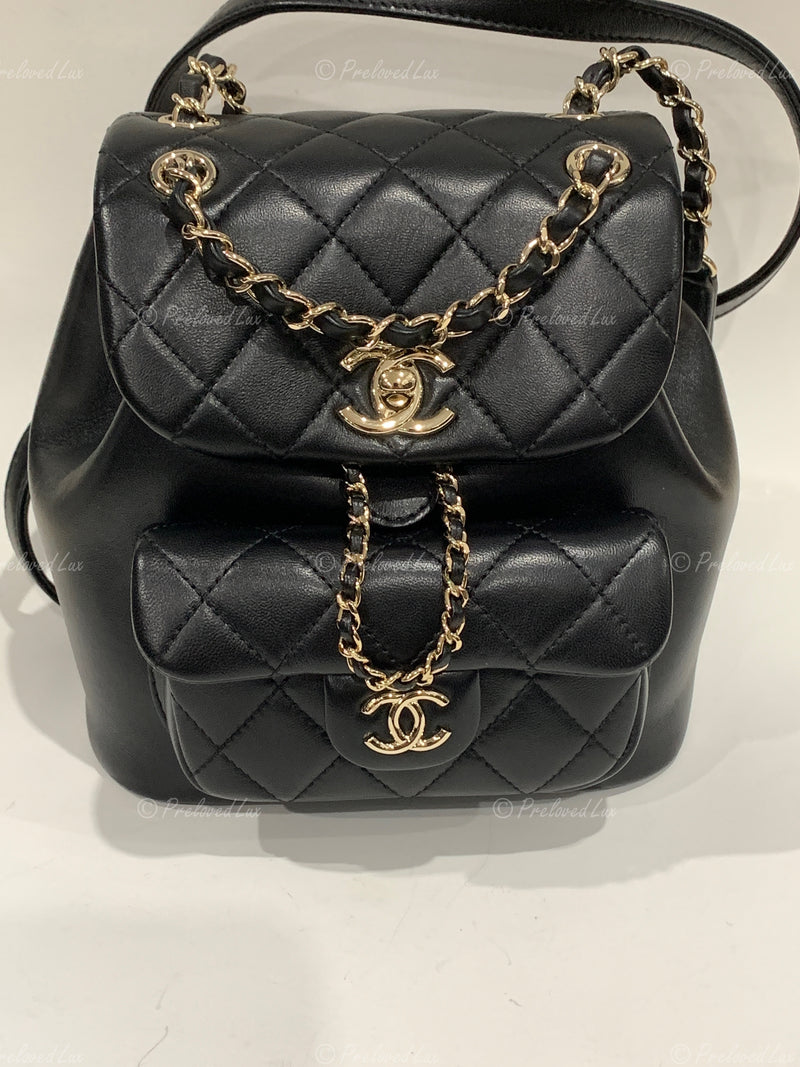 CHANEL Black lambskin Mini Duma Drawstring Backpack / Gold