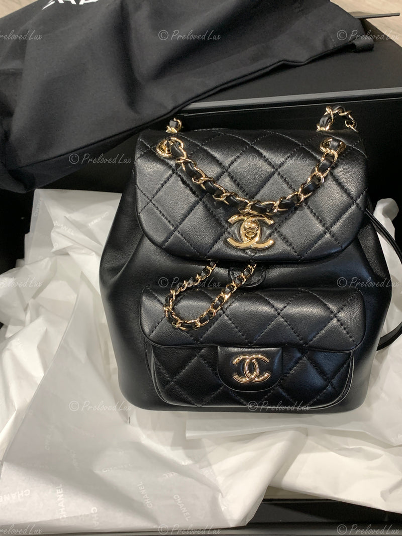 CHANEL Black lambskin Mini Duma Drawstring Backpack / Gold