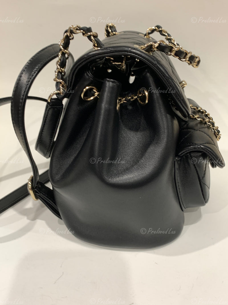 CHANEL Black lambskin Mini Duma Drawstring Backpack / Gold