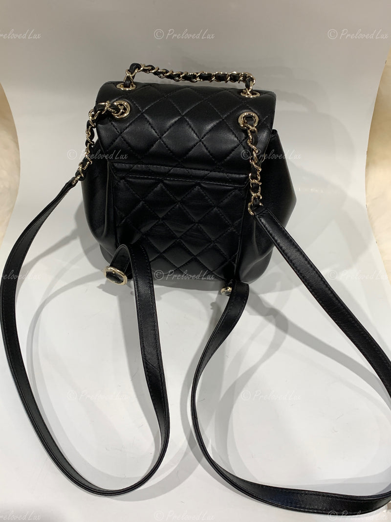 CHANEL Black lambskin Mini Duma Drawstring Backpack / Gold