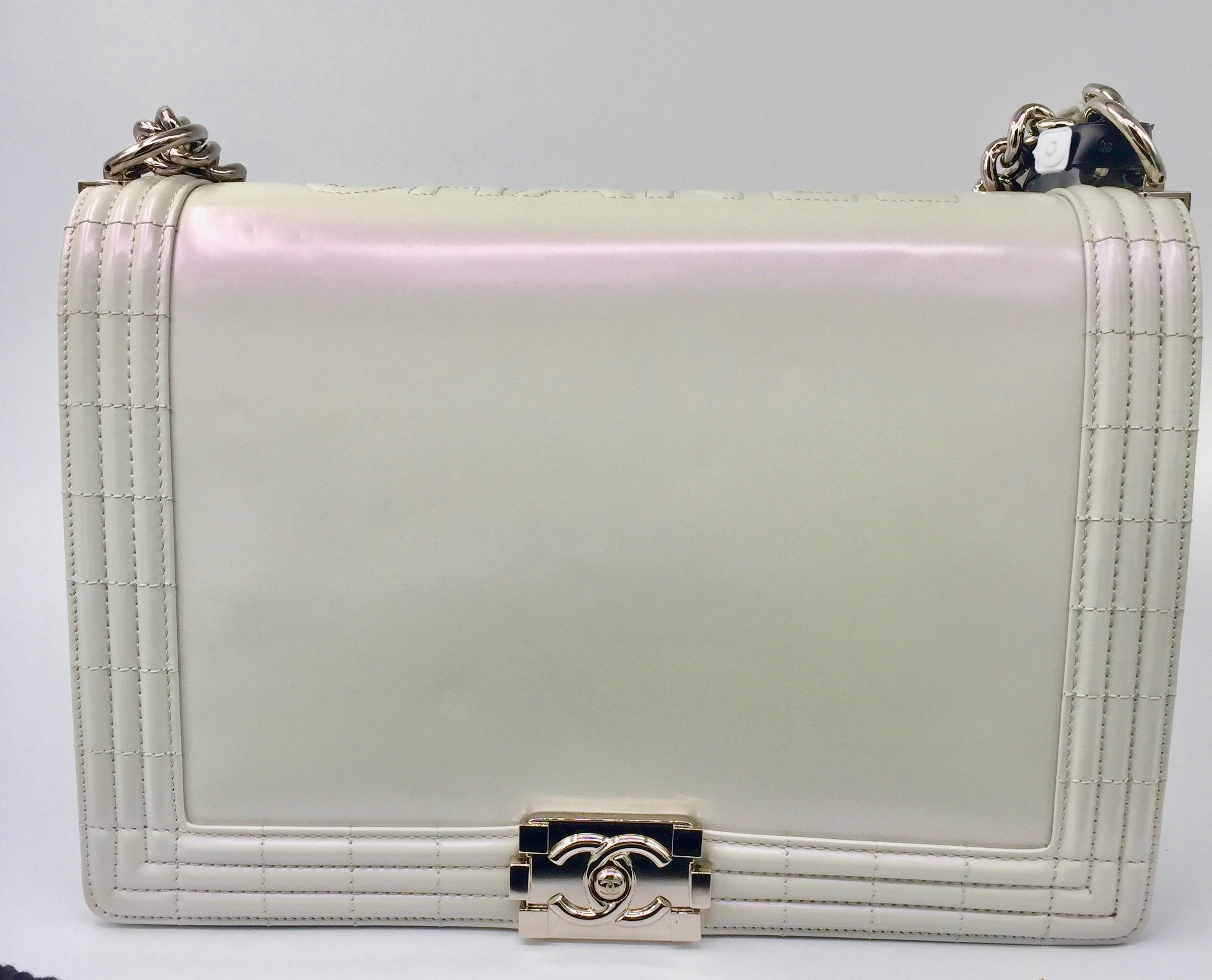 Sold-CHANEL Glazed Iridescent Calfskin Reverso Boy Bag large - pearl –  Preloved Lux