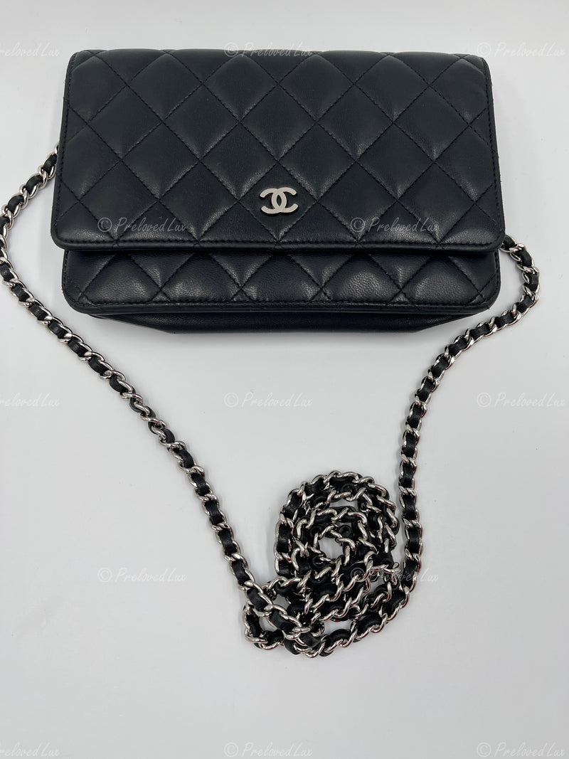CHANEL Black Lambskin Wallet-on-the-chain WOC Crossbody Flap Bag Silver  Hardware - Preloved Lux Canada