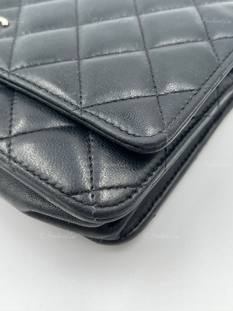 CHANEL Black Lambskin Wallet-on-the-chain WOC Crossbody Flap Bag Silver Hardware