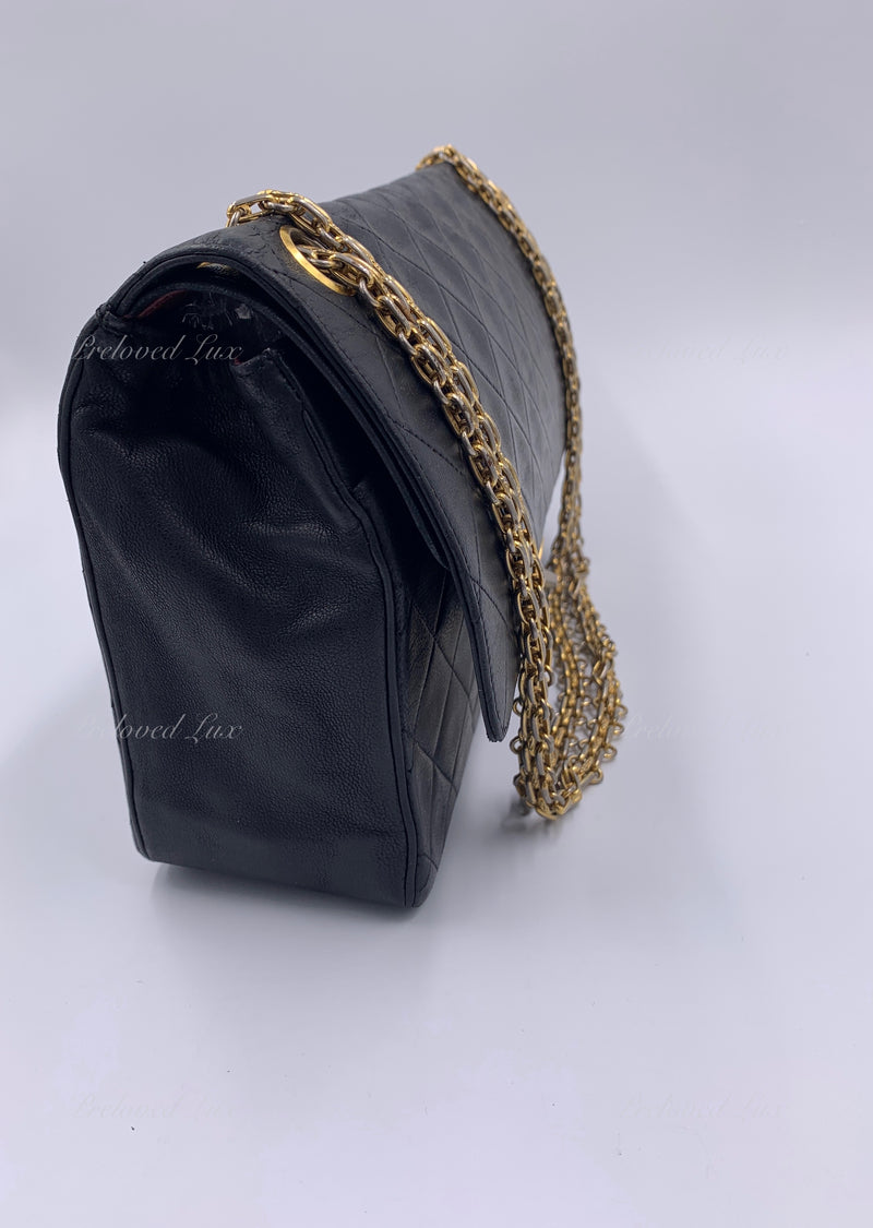 Vintage Chanel black 2.55 double flap chain bag with gold and silver CC.  Paris For Sale at 1stDibs