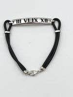 Tiffany & Co Atlas Roman Numeral Bar Black Rubber Cord Bracelet
