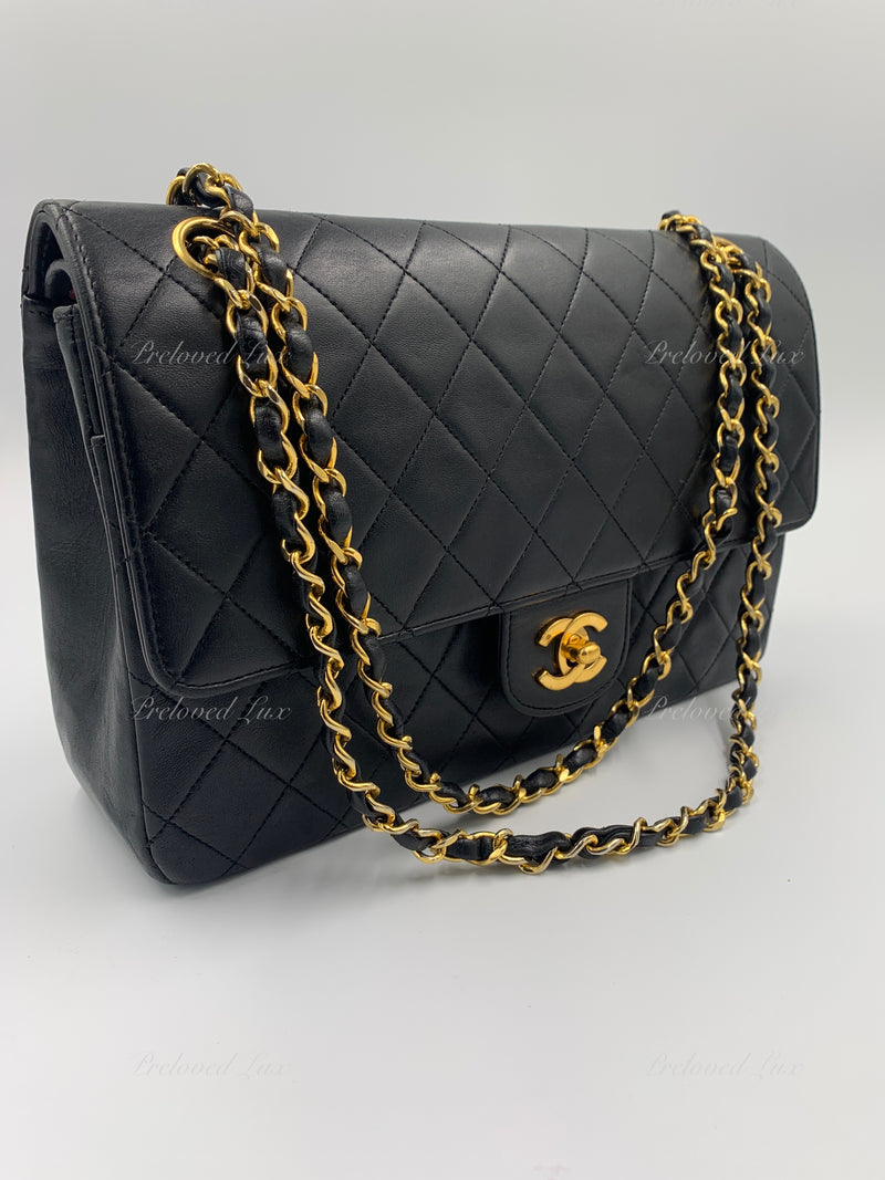 Large classic handbag, Grained calfskin & gold-tone metal, black — Fashion