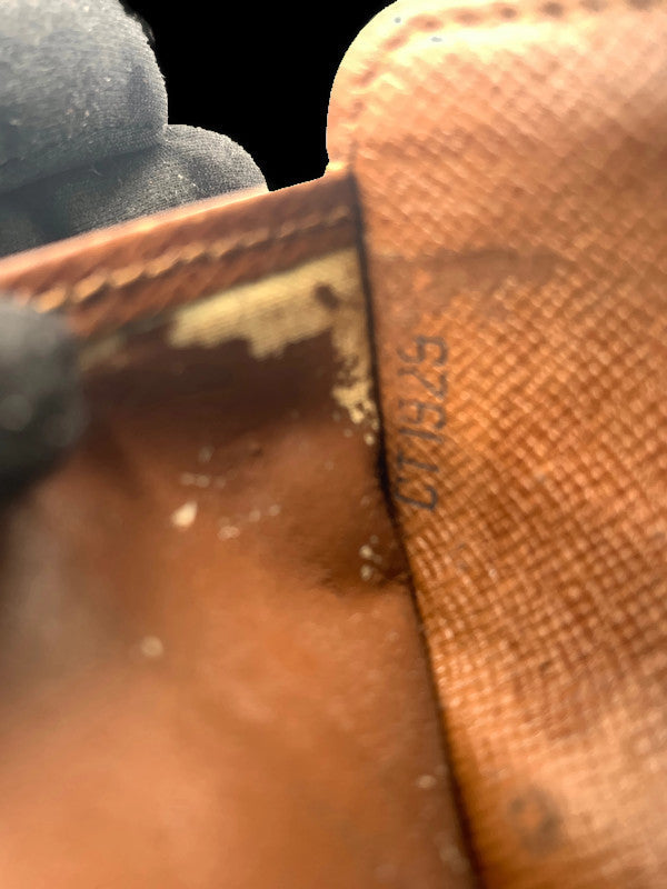 Louis Vuitton compact wallet from seller “Jerseyland020”. Took 21 days to  receive in the U.S., cost $27.76. Has a soft outside touch with  rough/strong inside feel. Nice stitching and know it'll last